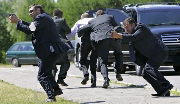 Protective services staff providing close protection